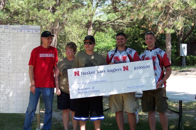The Claymon family making their annual donation to the Husker Bass Angler fishing team in memory of Andrew.